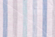 Broad multi coloured stripes on pink - linen